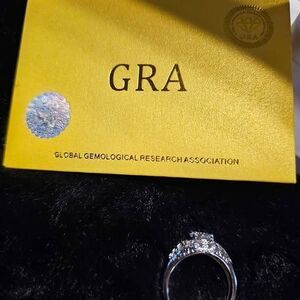 1CTW VVSD Moissanite Ring in 925 over, with pave accents. Size 9